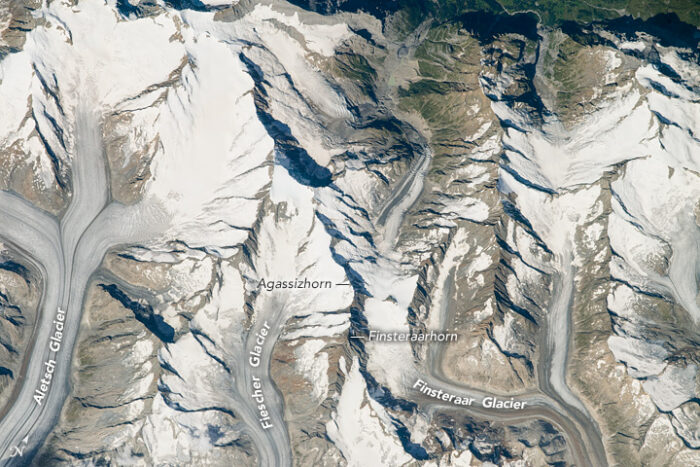 A photograph of peaks and glaciers in the Swiss Alps taken from the International Space Station.