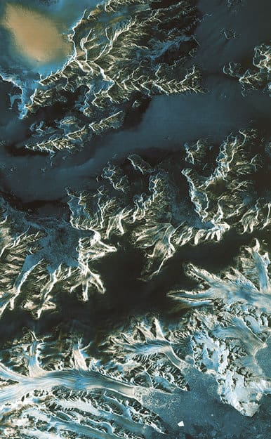 Acquired on 13 April 2014 at 23:57 GMT (14 April at 01:57 CEST) by Sentinel-1A, this image shows a transect over the northern part of the Antarctica Peninsula. It was acquired in the satellite’s ‘strip map’ mode with a swath width of 80 km and in dual polarisation. The colours indicate how the land, ice and water reflect the radar signal differently. Source: ESA.