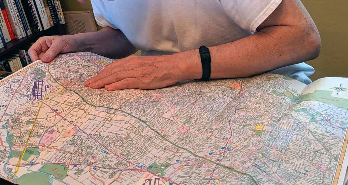 Man reading a paper map.