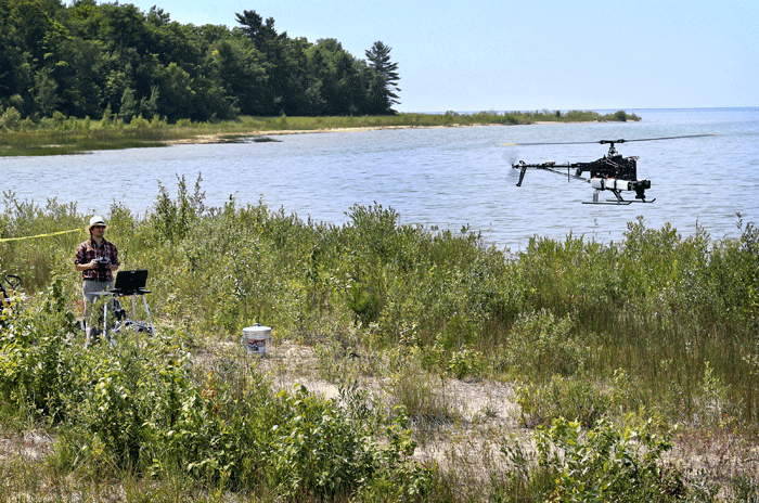 Benjamin Heumann, a professor with Central Michigan University uses a drone to map threatened plant species