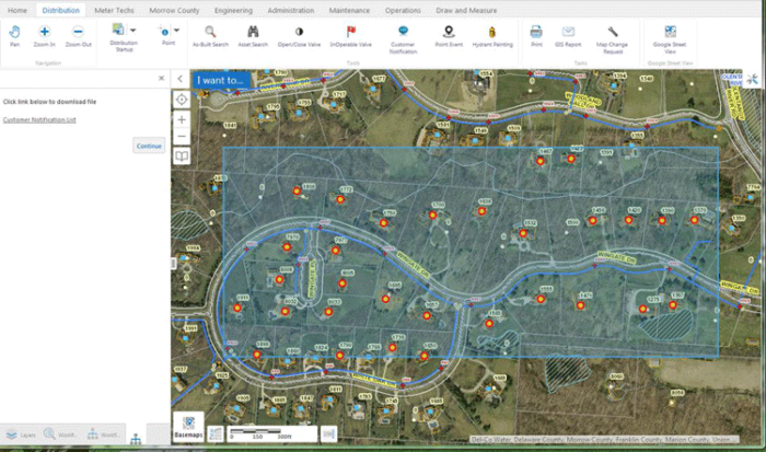 Screenshot of a mapping application with an aerial and a blue mesh overlay.