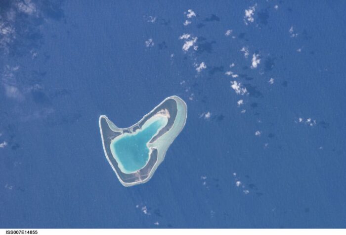 Tupai Atoll photographed from the International Space Station. Photo: NASA, public domain.