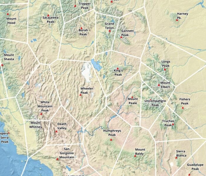 Shaded elevation map with Voronoi cells overlayed with white boundaries for the California and Nevada region.