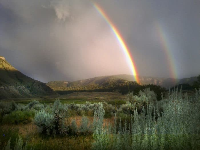 Double rainbow seen from Lower Mammoth in Yellowstone National Park. Photo: Dan Hottle/NPS, public domain.