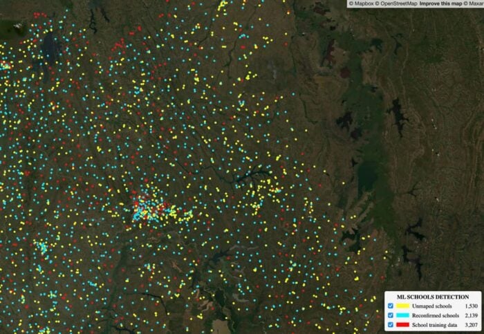 A section of Rwanda showing previously unmapped (yellow dots) schools. Source: Development Seed.