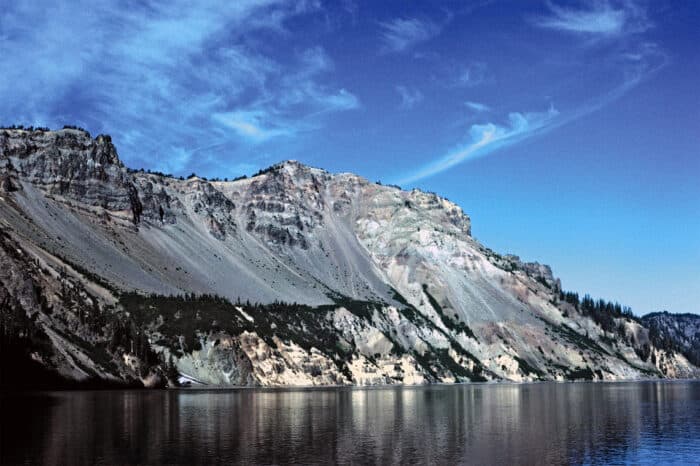 View southwest of Garfield Peak and Eagle Crags above Chaski Bay, Crater Lake. Photo: Charles Bacon, USGS, public domain.