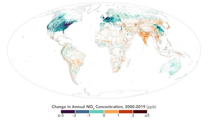 Outline map of the world showing changes in nitrogen dioxide levels shaded from dark teal to dark red.
