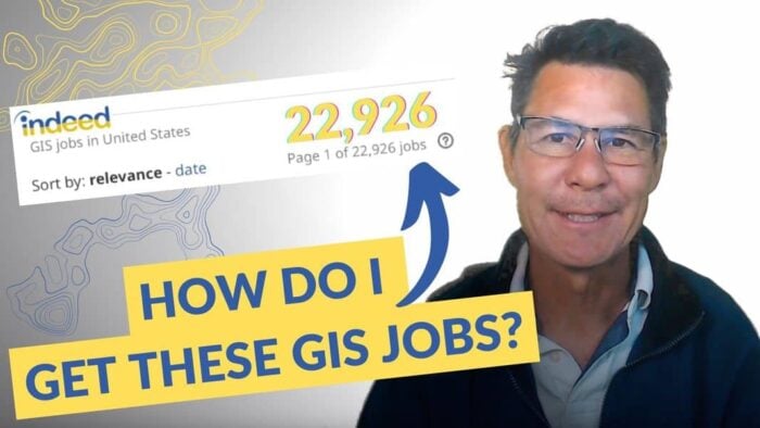 Screenshot from a video with a man looking at the screen and the text "How do I get these GIS jobs" written in blue against a yellow background.