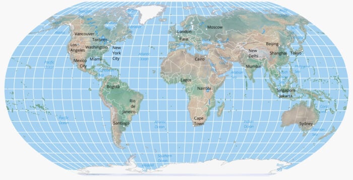 A map of the world with the ocean in blue and the land masses shaded to replicated vegetation for the area. The world is covered in white graticule lines.