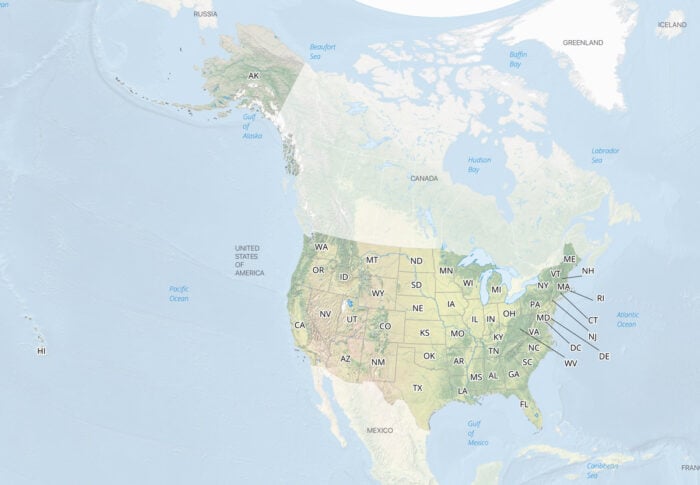 A map with natural shaded relief of the United States with neighboring countries shown with a muted white overlay.