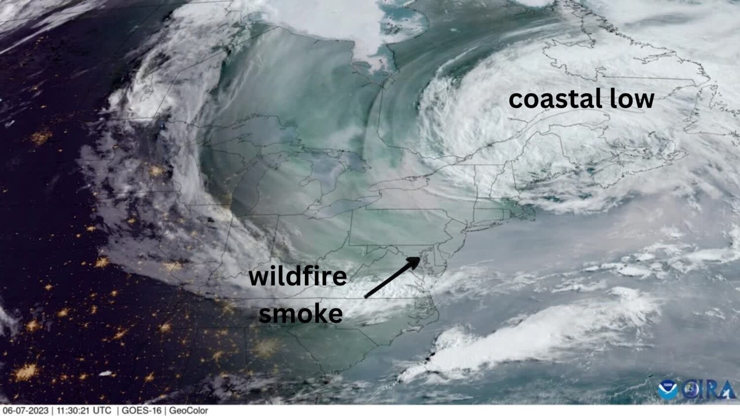 Annotated satellite image showing a coastal low and wildfire smoke over the northeastern part of the United States.