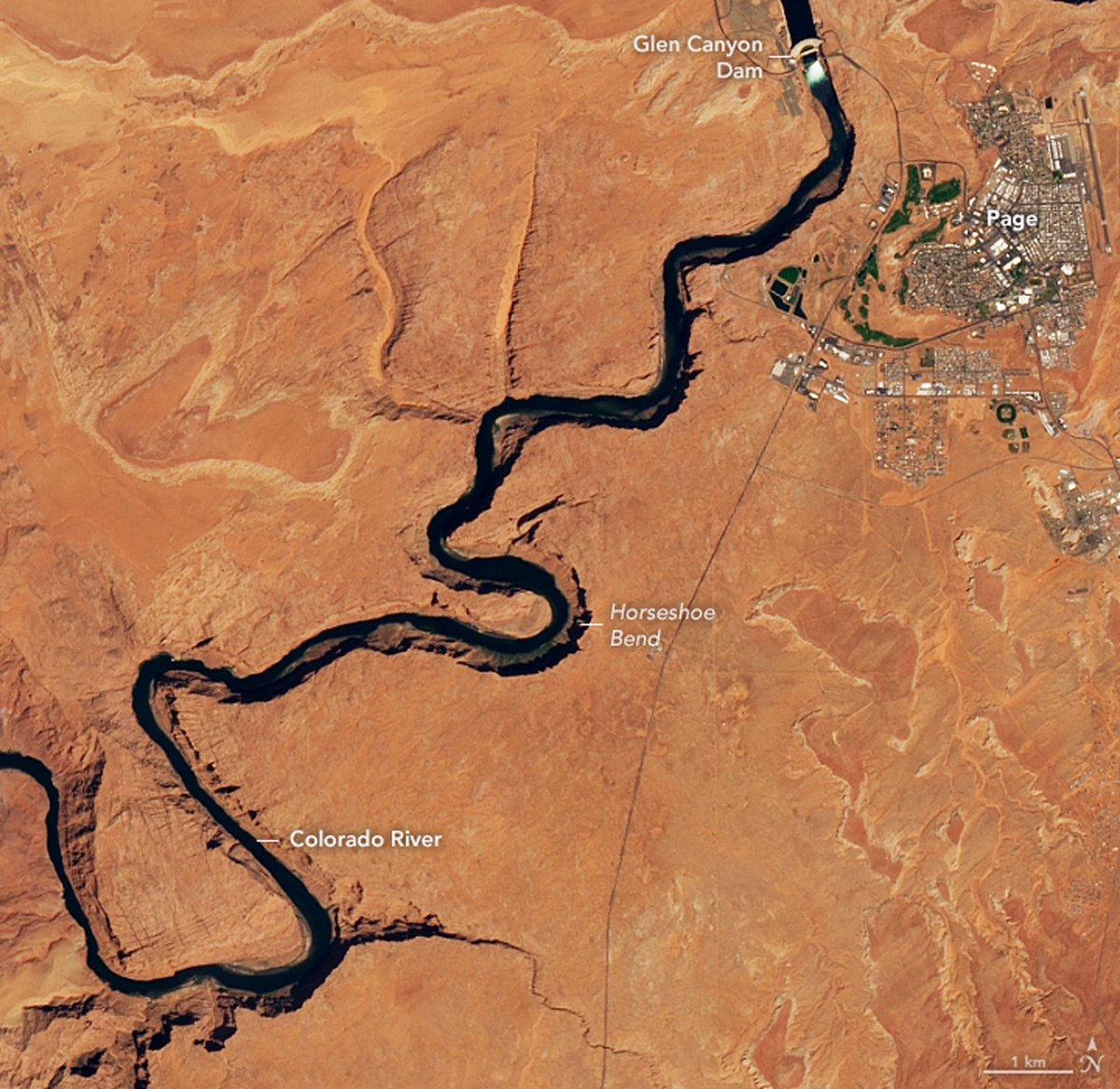 An annotated satellite image showing a winding river in the middle of a desert.