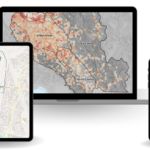Illustration of geographic information system (GIS) maps displayed on a tablet, laptop, and smartphone, showing spatial analysis, digital mapping, and aerial imagery.